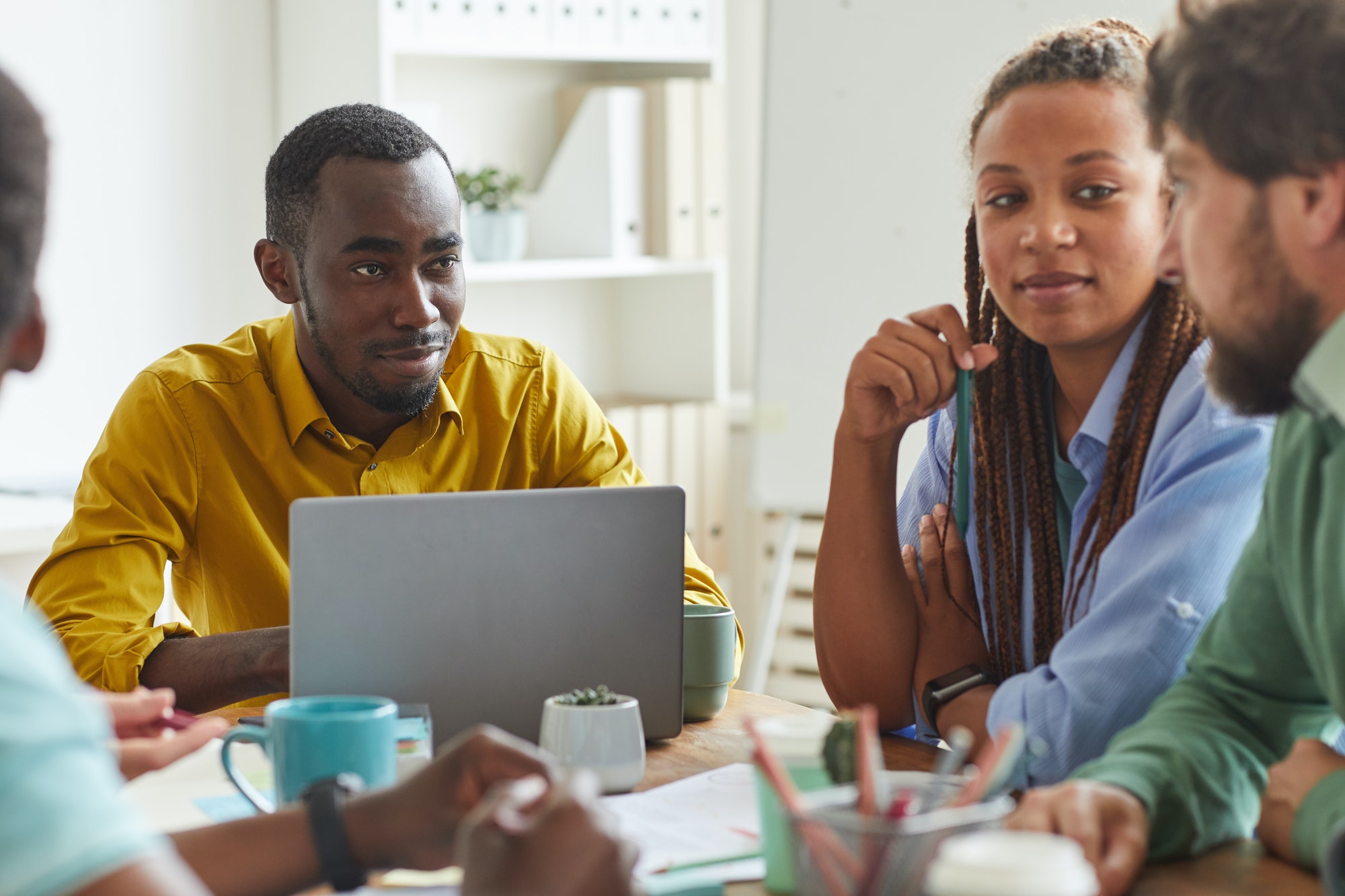 Multi-Ethnic Business Team Meeting Multi-Ethnic Business Team Meeting